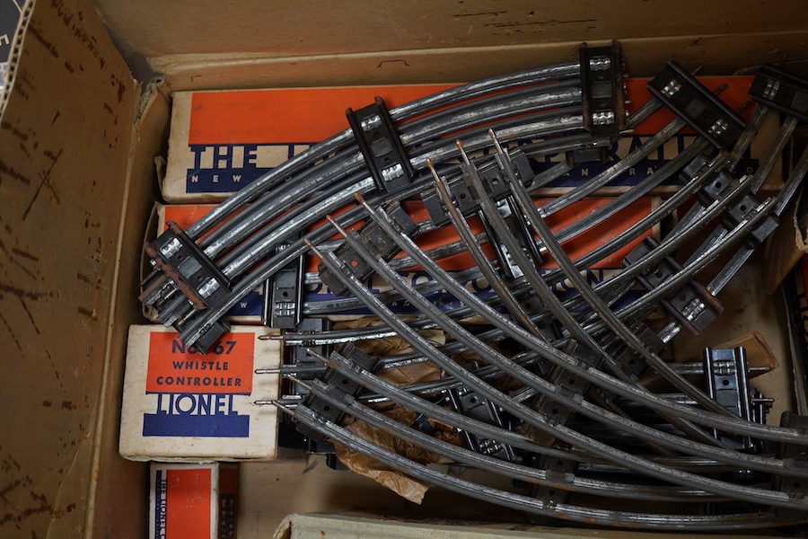 A boxed Lionel 0 gauge ‘Flying Yankee’ train set, comprising of a streamlined articulated diesel locomotive No.616, and three articulated chrome bogie cars; two No.617 and an observation car No.618, together with a boxed